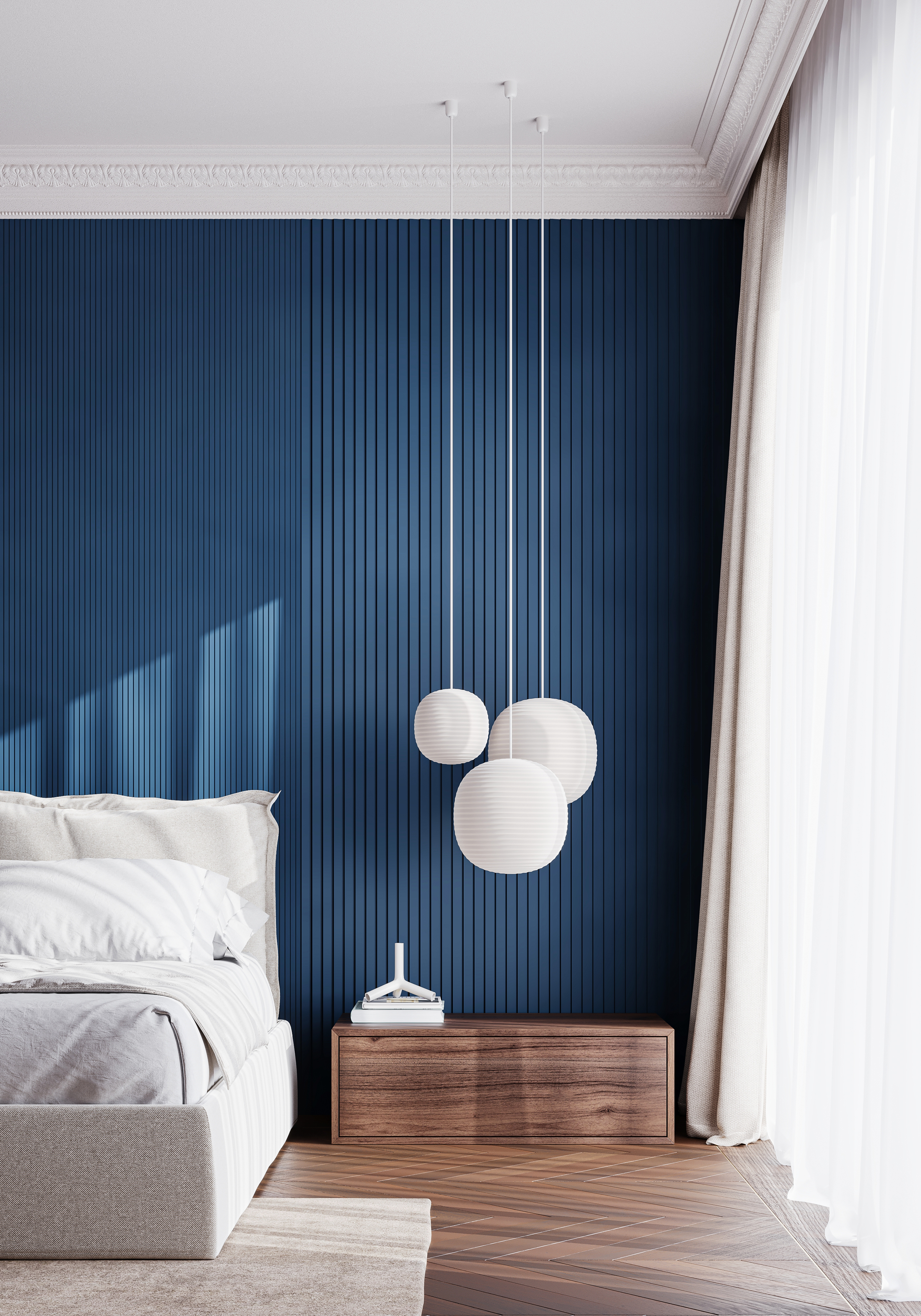 Стельовий карниз Orac Decor у сучасній спальні з синьою акцентною стіною та підвісними світильниками